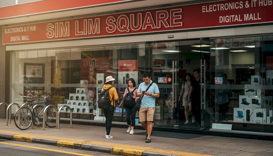 Shoppers arriving at electronics mall entrance